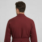 Wine-red plush men's waffle spa bathrobe from Plush Fashion Hub, showing the back view with small size and lightweight absorbent fabric.