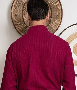Wine-red plush men's waffle spa bathrobe from Plush Fashion Hub, showing the back with a lightweight, absorbent texture.
