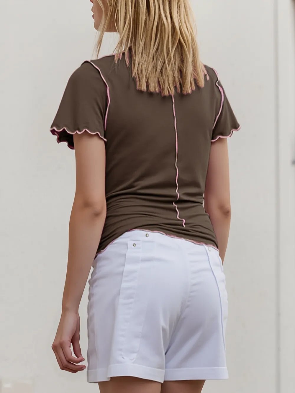 Women's stretch knit short sleeve tee with contrast trim mock neck, from Trendsi, featuring a casual and stylish design.