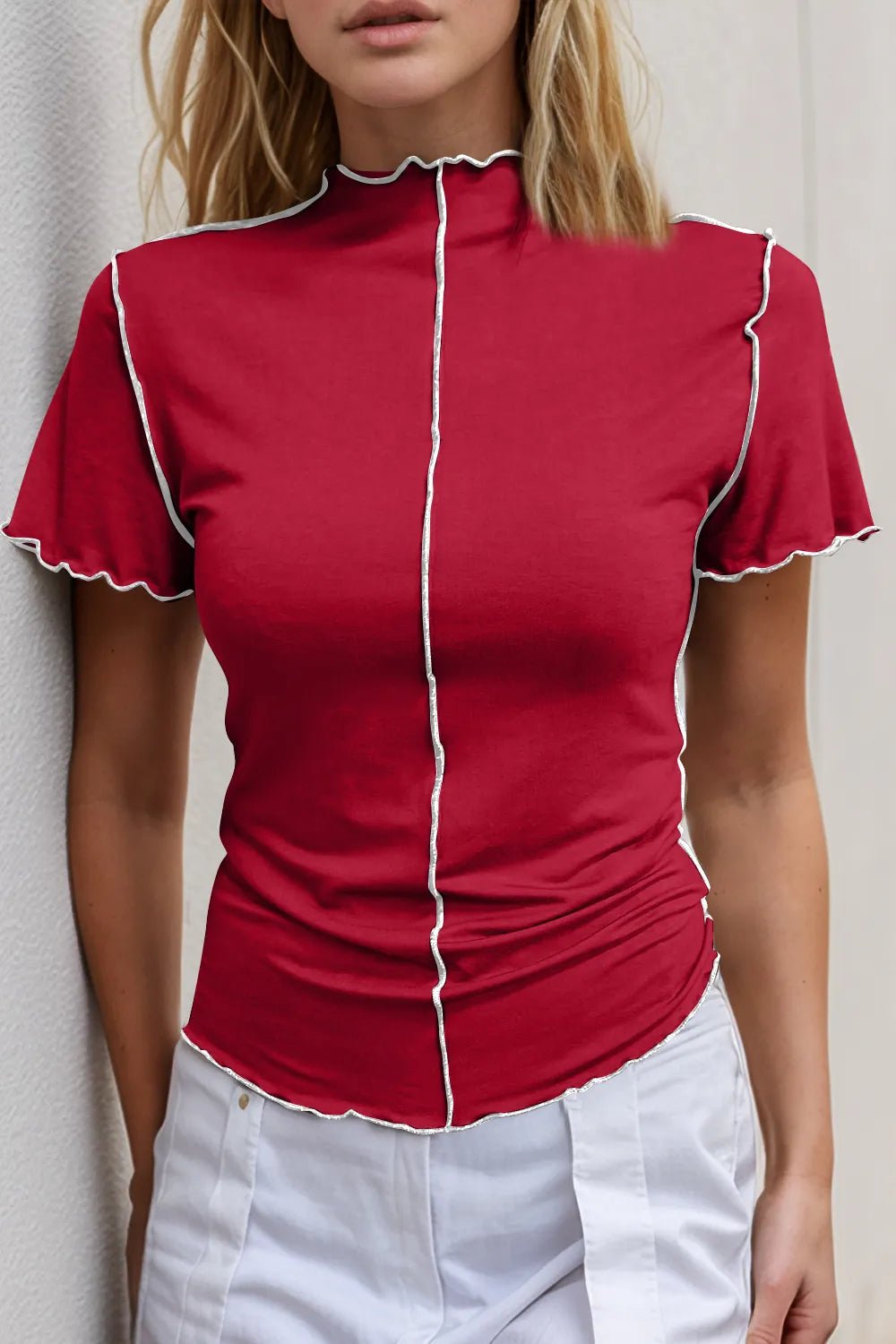 Women's contrast trim mock neck short sleeve tee from Trendsi, featuring a stretch knit fabric and stylish design.