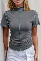 Women's contrast trim mock neck short sleeve knit tee, trendy women's apparel by Trendsi featuring a stylish design.