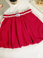 Lace trim elastic waist mini skirt from Trendsi featuring a fitted silhouette and stylish lace detailing.