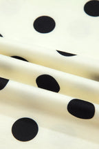 Polka dot print high neck dolman top from Plush Fashion Hub, featuring a relaxed fit and stylish design.