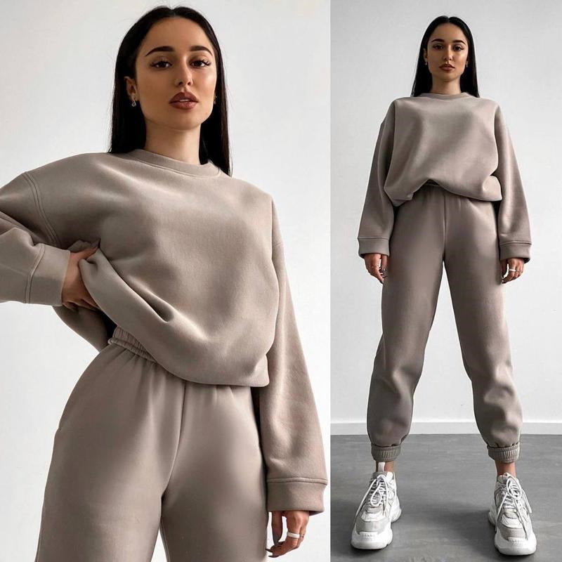 Women’s loose fit crewneck sweatshirt and jogger pants two-piece set by Plush Fashion Hub, casual loungewear ensemble.