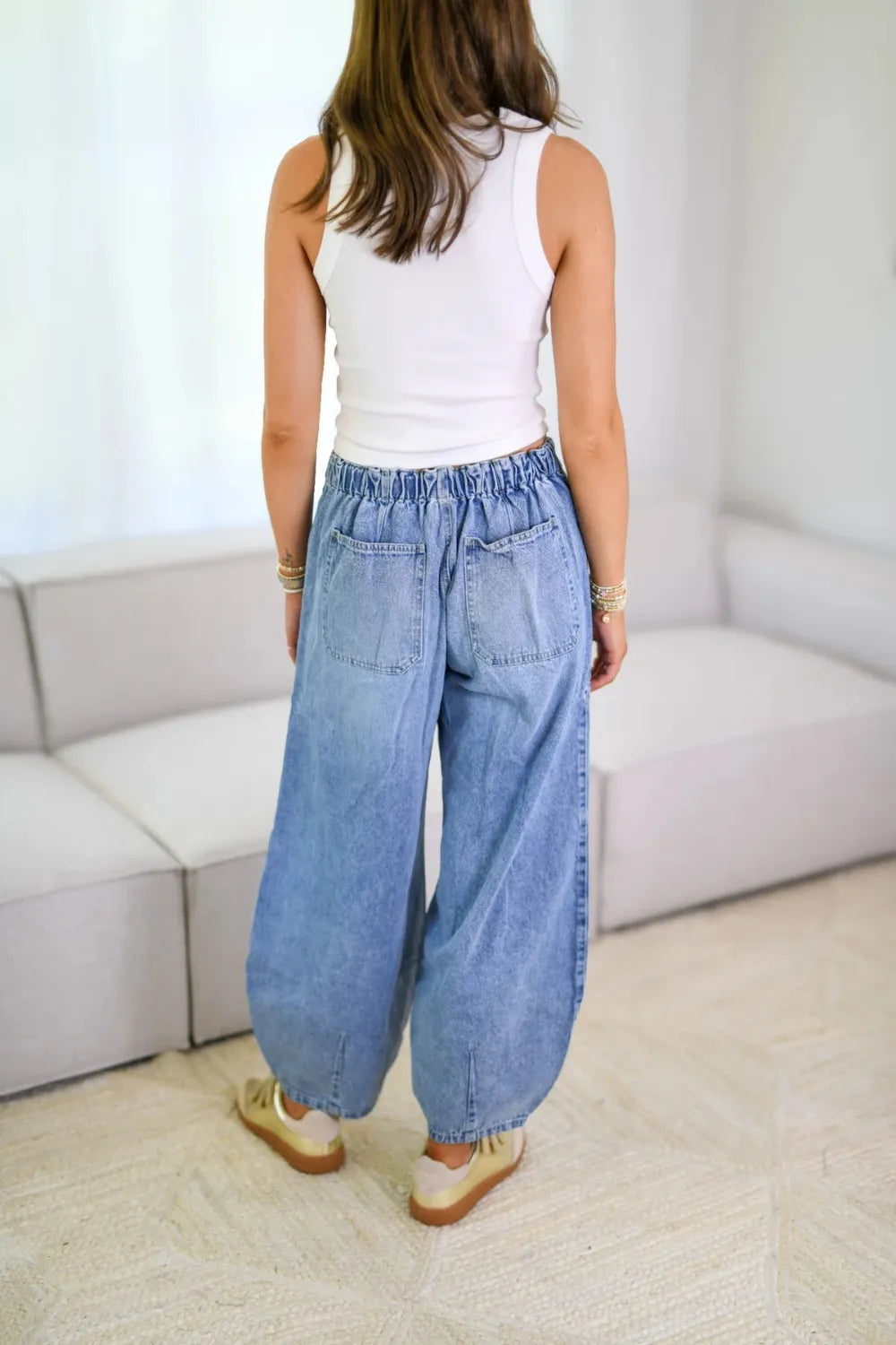 Plush Fashion Shop denim drawstring jeans with front pockets, casual fit, and classic blue denim fabric.