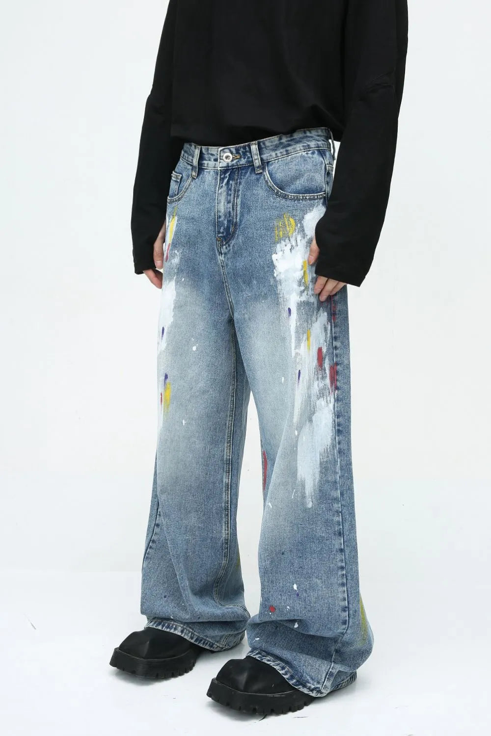 Denim painting jeans with pockets from Plush Fashion Shop, showcasing distressed detailing and classic five-pocket design.