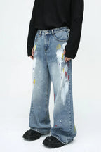 Denim painting jeans with pockets from Plush Fashion Shop, showcasing distressed detailing and classic five-pocket design.