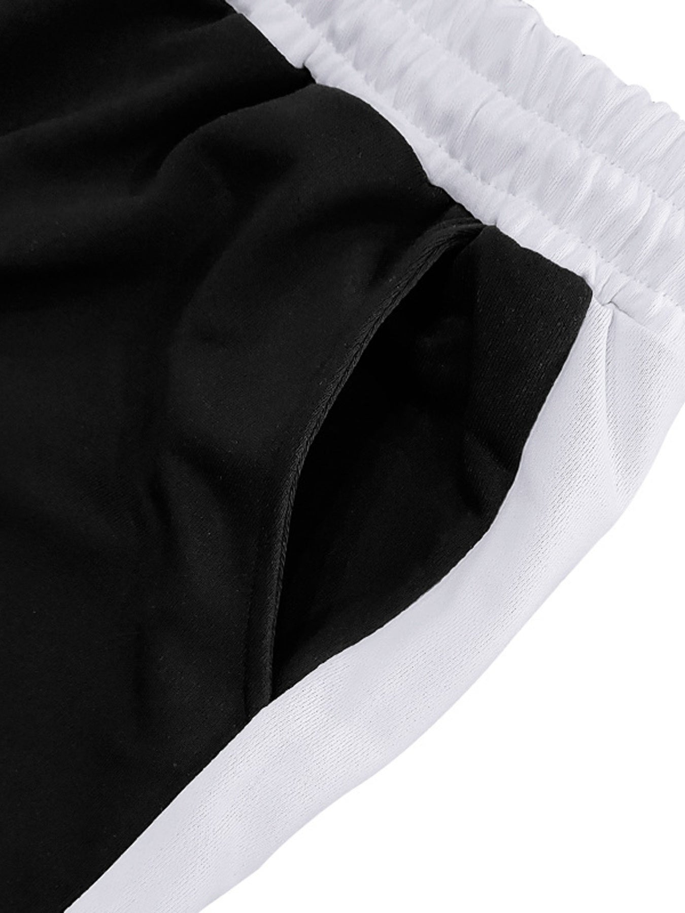 Plus size men's sweatpants by Trendsi with contrast stripe design and drawstring waist, casual athletic loungewear.