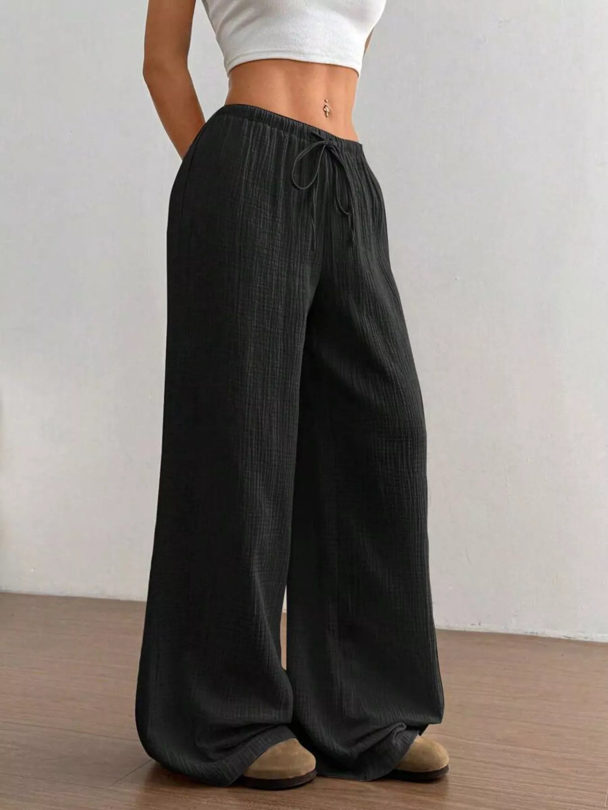 Plush Fashion Hub wide-leg drawstring pants in soft fabric, featuring a relaxed fit and casual style.
