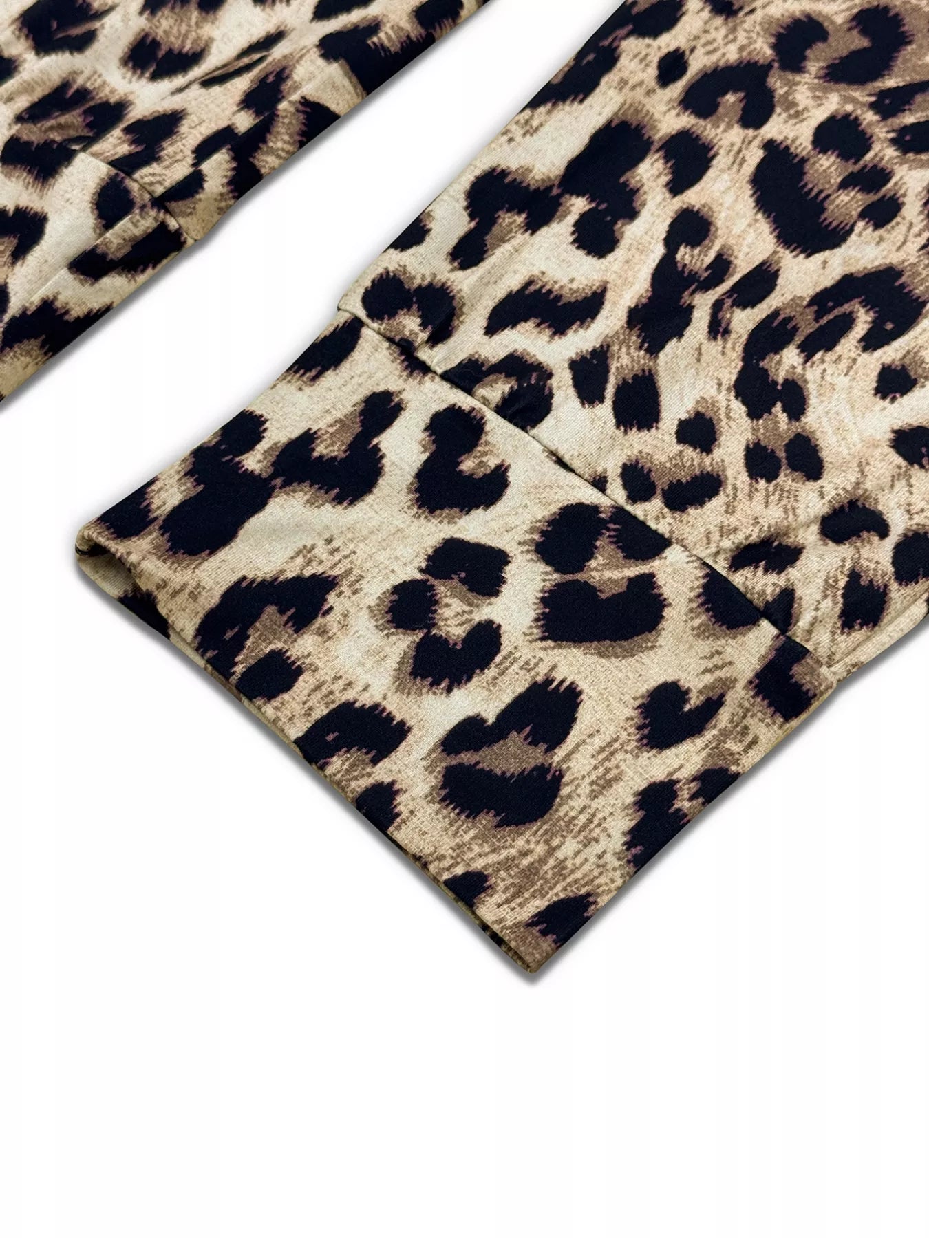 Leopard print one-shoulder top and matching pants set by Simply Love, stylish and trendy for casual or party wear.