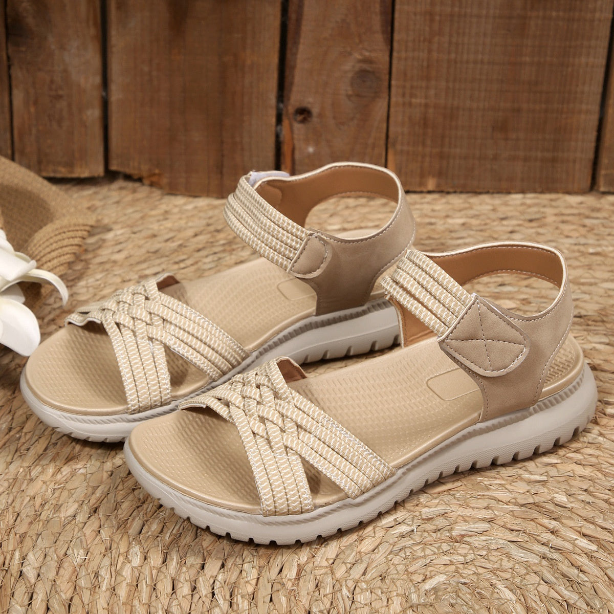 Women's open toe woven strap flat sandals with faux leather slides, featuring a comfortable design and stylish casual footwear.