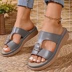 Open toe buckle sandals by Shopimist with adjustable strap and chunky heel on a neutral background.