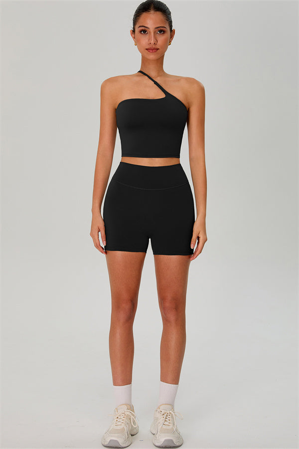 Fitglutes activewear one-shoulder crop top and matching shorts 2-piece gymwear set, designed for workout and sports activities.
