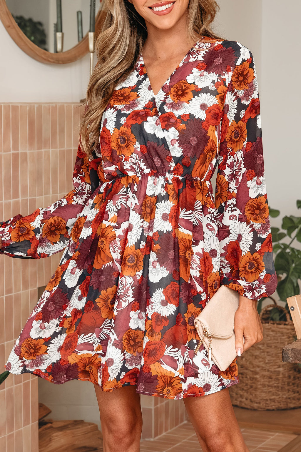 Marianna Sleeve Flowy Mini Dress by Threaded Pear featuring a floral pattern and lightweight, breezy fabric on a model.