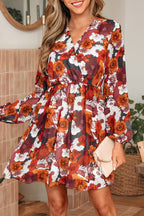 Marianna Sleeve Flowy Mini Dress by Threaded Pear featuring a floral pattern and lightweight, breezy fabric on a model.
