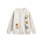 Women’s retro floral embroidered cardigan sweater by FitiqueFit, featuring colorful floral embroidery on a cozy knit fabric.