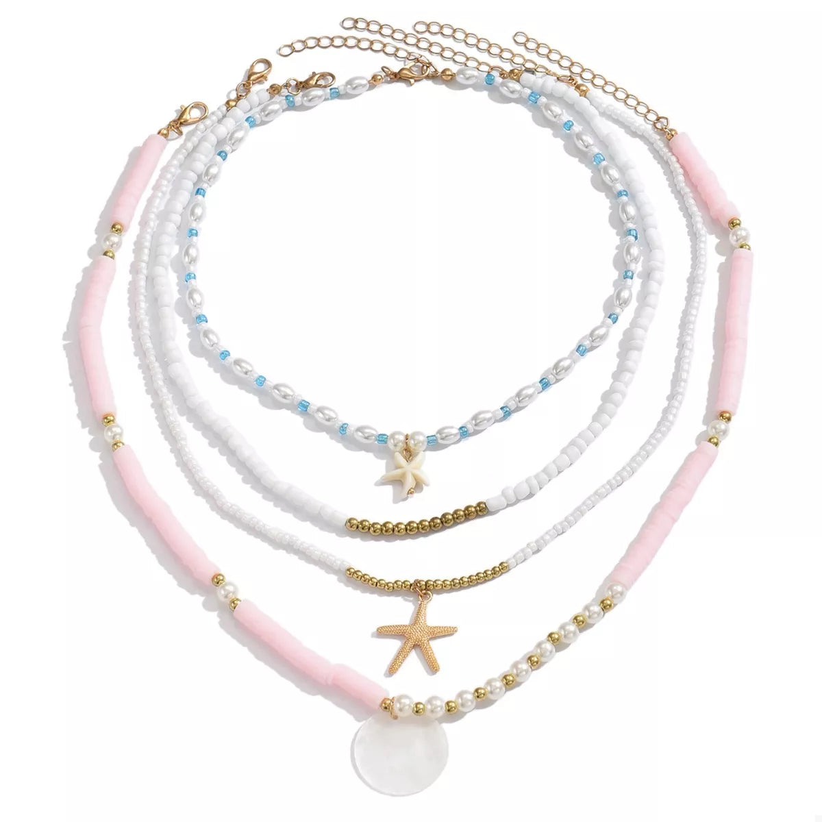 Four beaded starfish charm necklaces with colorful beads, layered design, and silver chains, by Plush Fashion Hub.