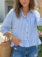 Women's striped button-down blouse with ruffled hem, lightweight viscose fabric, stylish and casual fashion by Trendsi.