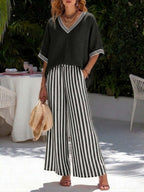 Women's striped tunic top and casual trousers two-piece set by FitiqueFit, featuring a relaxed fit and comfortable fabric.