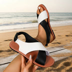 Women's color-block cross-strap flat sandals by FitiqueFit, showcasing vibrant straps and comfortable flat sole.