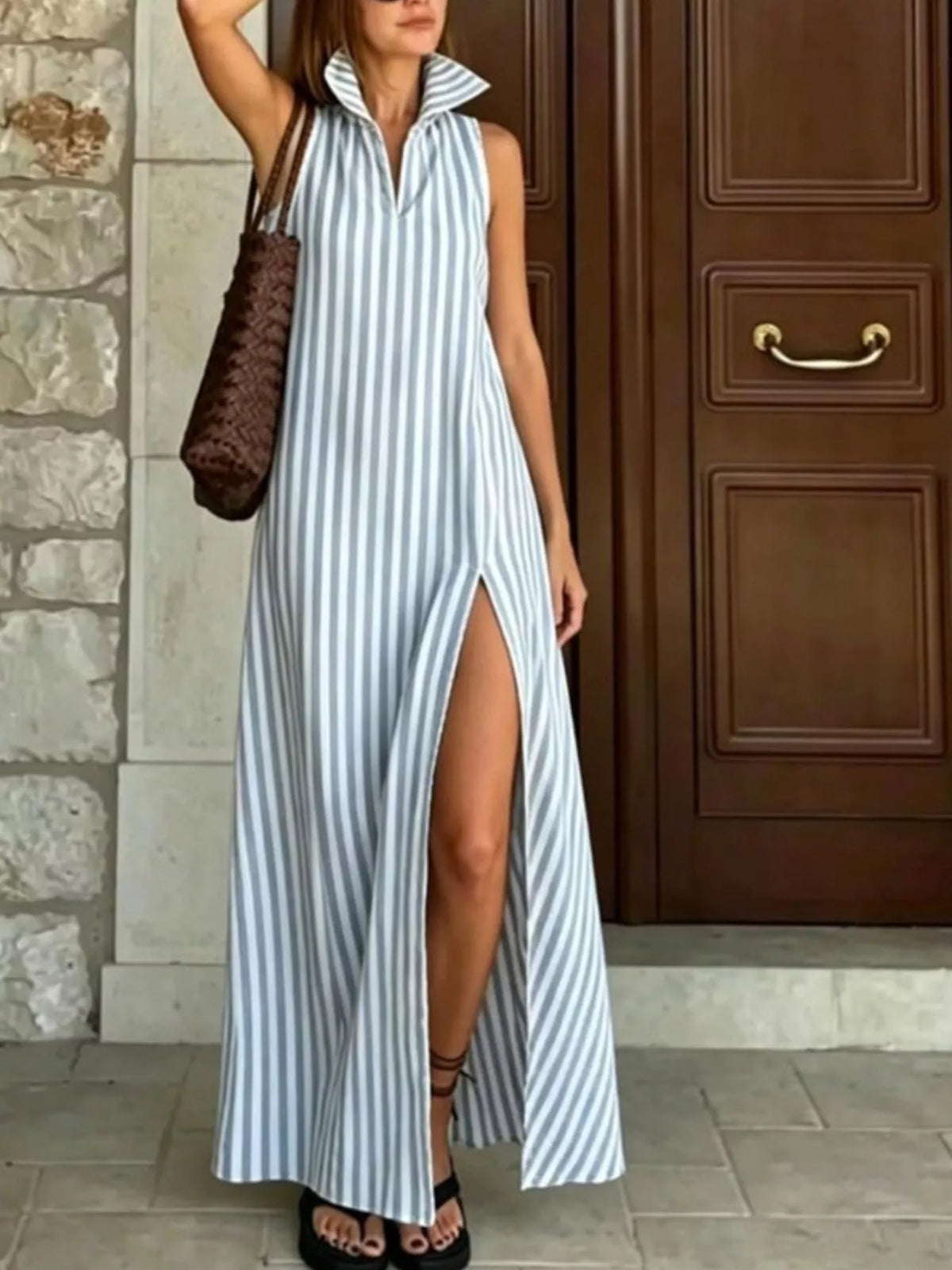 Plus size striped maxi dress with high slit by Trendsi, flowing fabric, and bold striped pattern perfect for casual or dressy occasions.