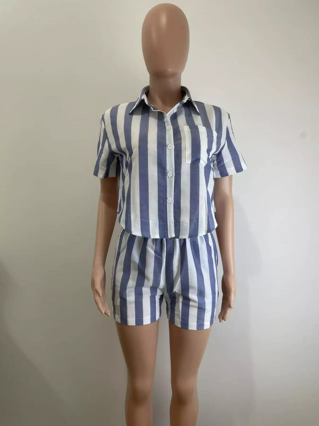 Striped button-up top and shorts set by Shopimist, featuring a casual, stylish design perfect for warm weather.