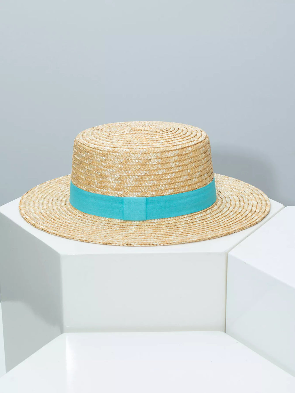 Plush Fashion Hub classic wheat straw boater hat with decorative ribbon, stylish summer accessory for sunny days.