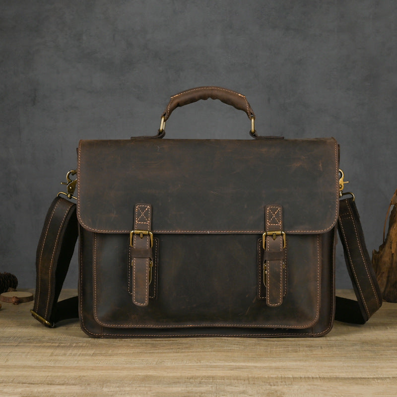 Plush Fashion Hub leather one-shoulder crossbody laptop bag with top layer design and adjustable strap, ideal for everyday use.