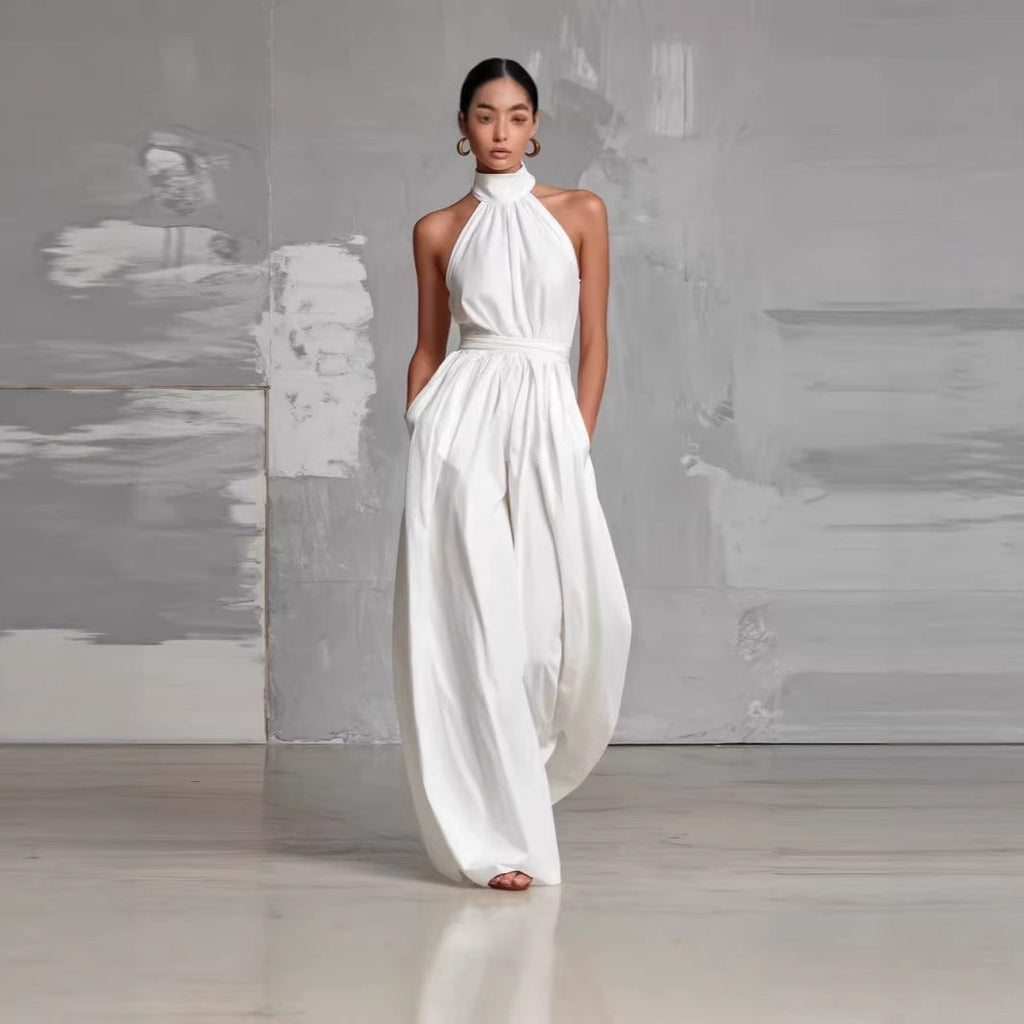 Women's belted pleated high-waist sleeveless jumpsuit, casualwear from Plush Fashion Hub, shown with a cinched waist and stylish pleats.