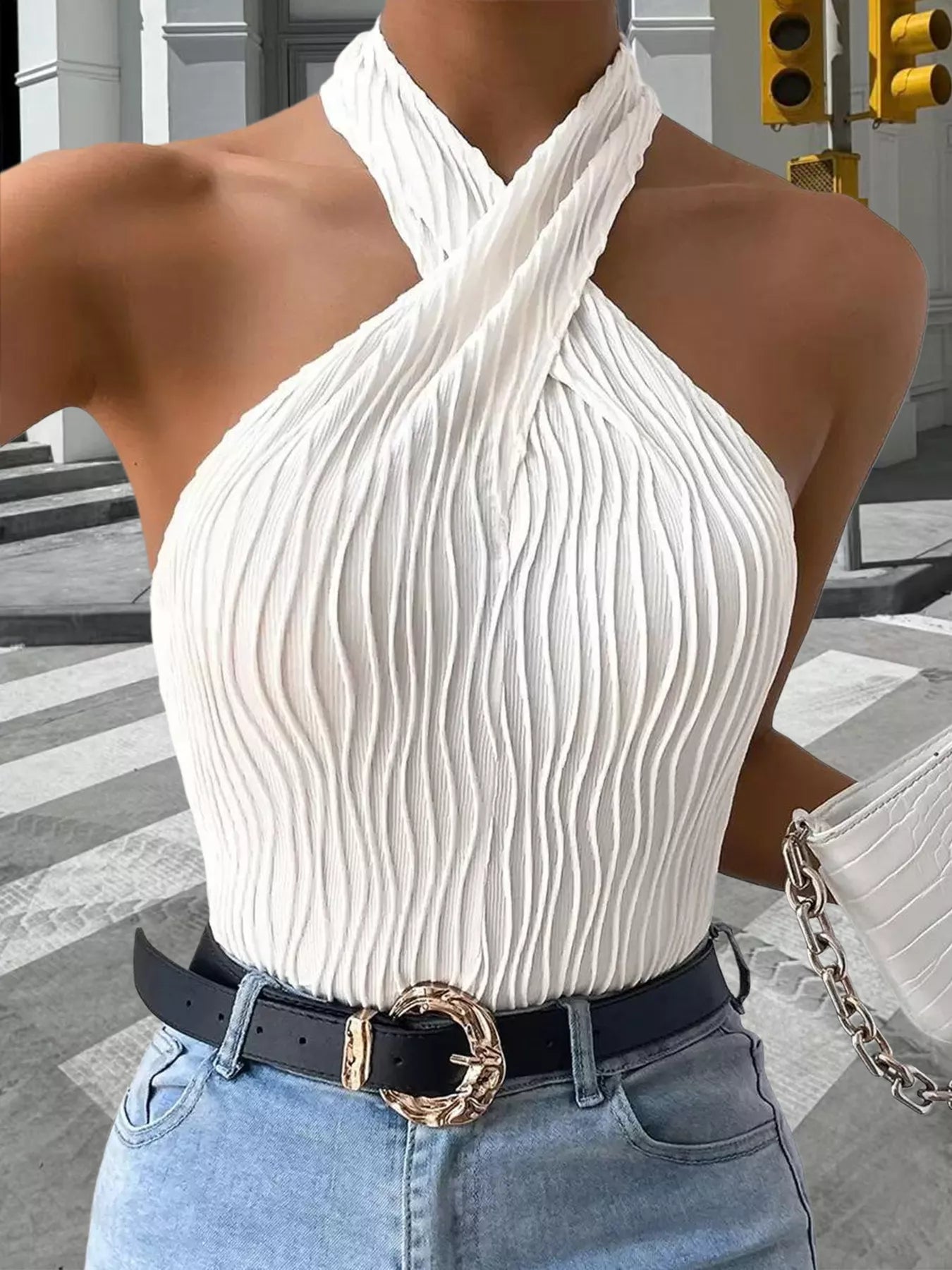Textured halter neck tank top from Plush Fashion Hub, featuring a stylish design and comfortable fit.
