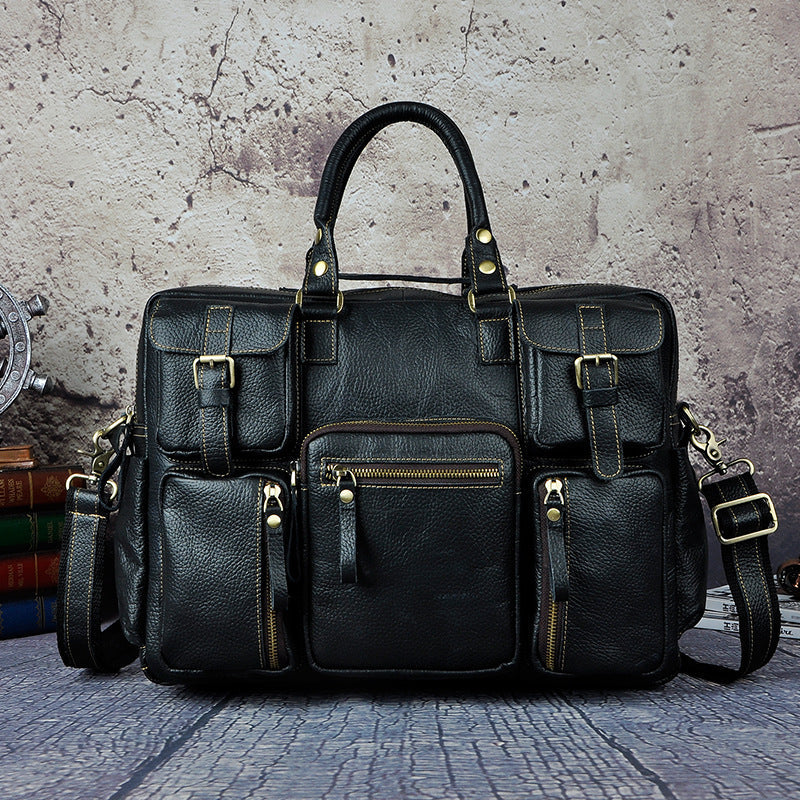 First layer cowhide men's 16-inch large-capacity briefcase with multiple compartments and sturdy handles, from Plush Fashion Hub.
