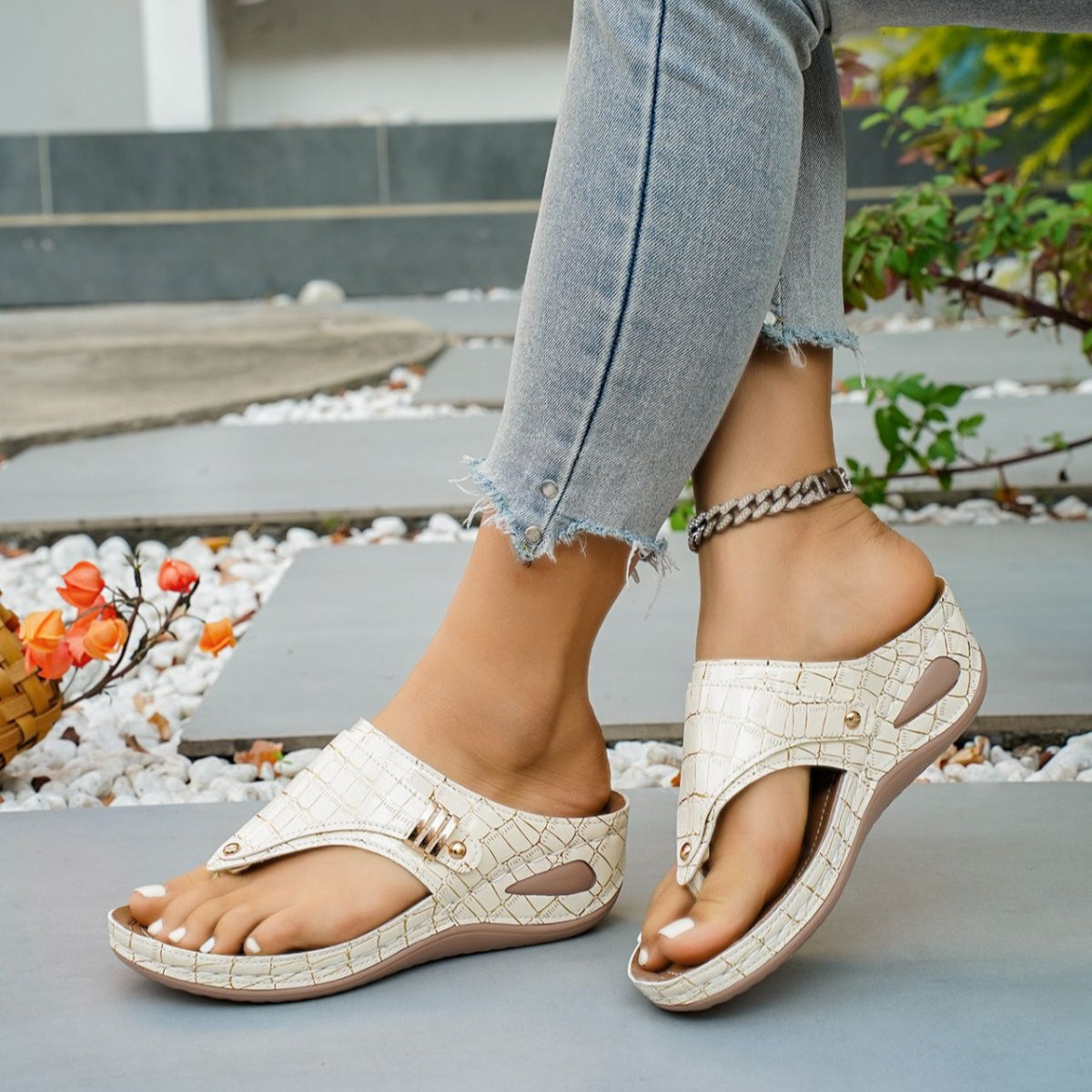 Women's faux leather toe post wedge sandals with mid-heel, stylish design and comfortable fit from Trendsi.