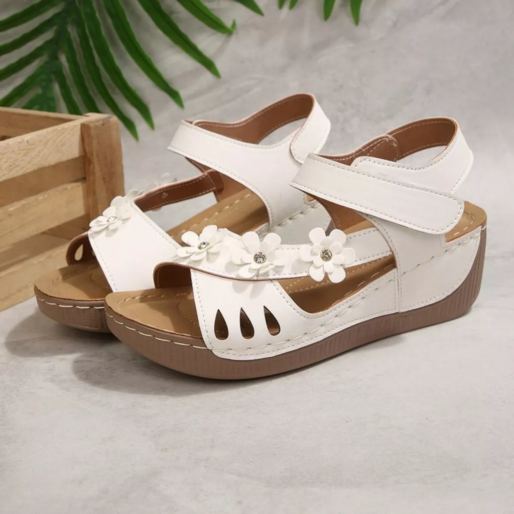 Floral embellished wedge sandals by Shopimist featuring colorful flower details and comfortable cork heel.