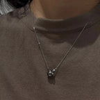 Planet Pearl Pendant Necklace by Shopimist featuring a luminous pearl pendant on a delicate chain.