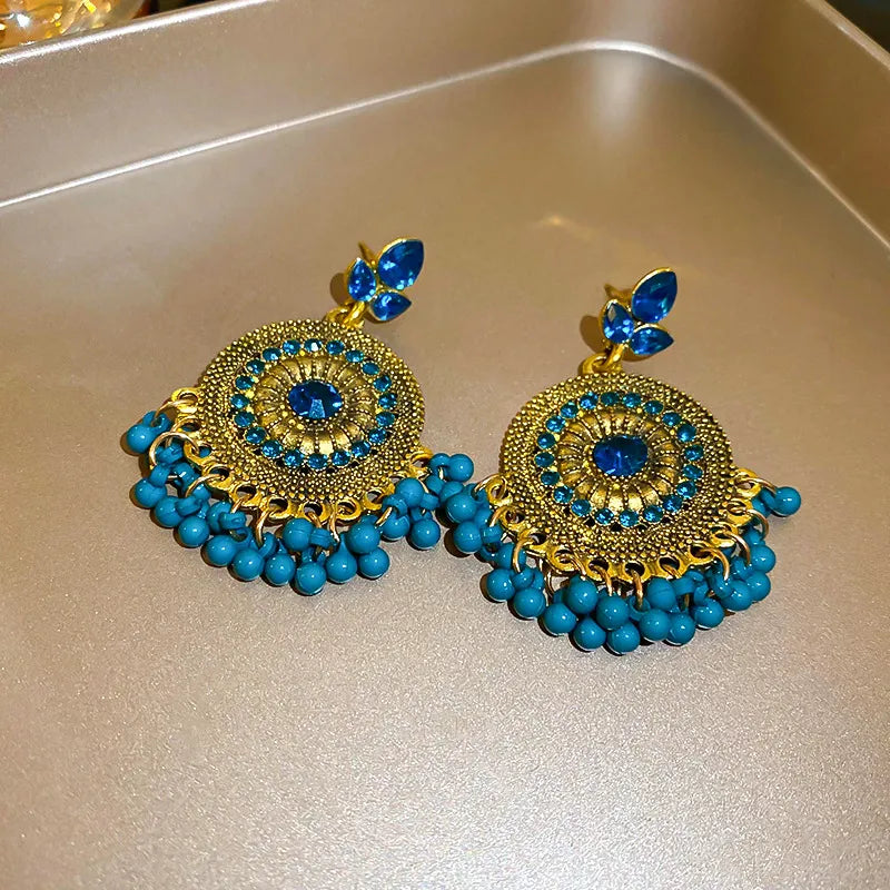 Rhinestone alloy bead dangle earrings with sparkling stones and intricate metalwork, stylish jewelry accessory