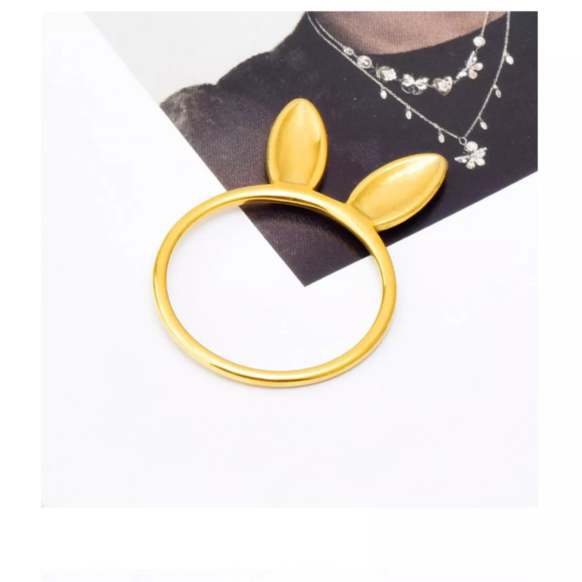 Gold-plated bunny ear ring from Plush Fashion Hub, featuring a cute bunny design in 18K gold plating on a ring.