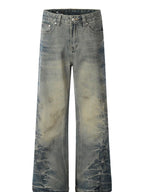 Men's washed wide-leg jeans by Trendsi, showing relaxed fit and light fading denim with pockets and belt loops.