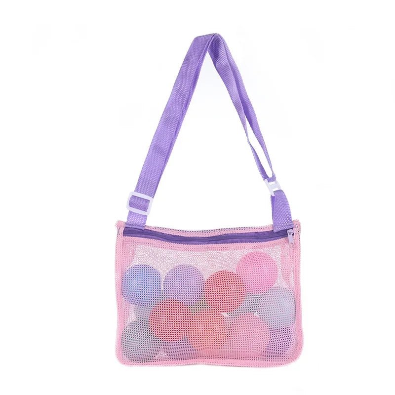 Perfecsy mesh beach toy bag for kids, featuring seashell design, ideal for storing sand toys, pool accessories, and swimming gear.