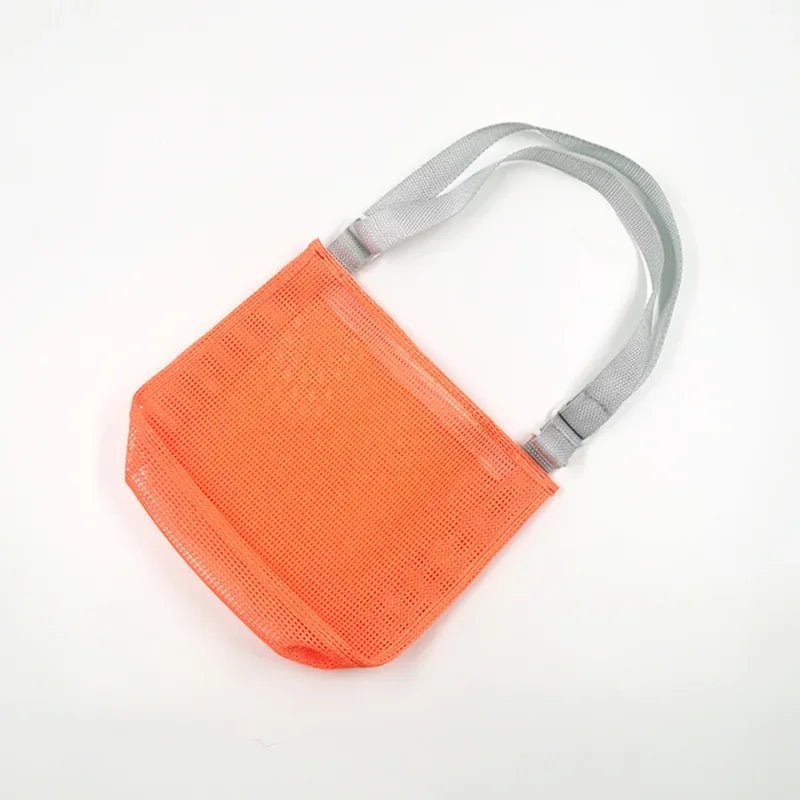 Perfecsy mesh beach toy bag for kids, featuring seashell design, perfect for storing sand toys, pool accessories, and seashells.