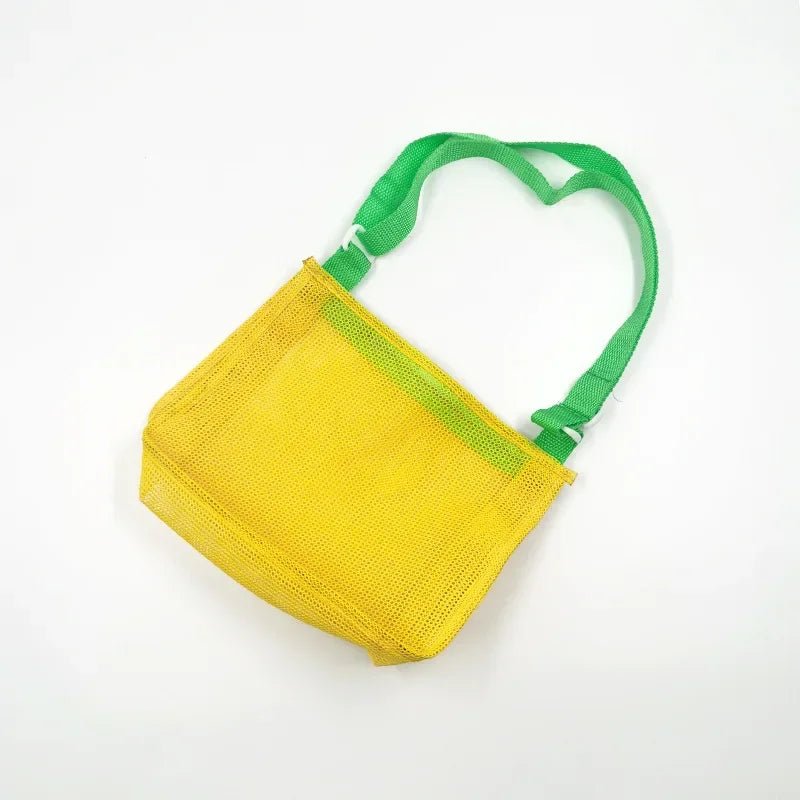 Perfecsy mesh beach toy bag with seashell design, perfect for kids to store sand toys, pool accessories, and shells.
