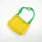 Perfecsy mesh beach toy bag with seashell design, perfect for kids to store sand toys, pool accessories, and shells.
