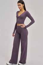 Fitglutes Activewear long sleeve crop top with a fitted design, shown in a stylish, athletic fit on a model.