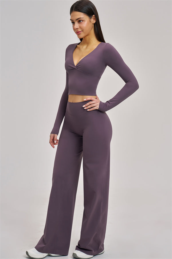 Fitglutes Activewear long sleeve crop top with a fitted design, shown in a stylish, athletic fit on a model.