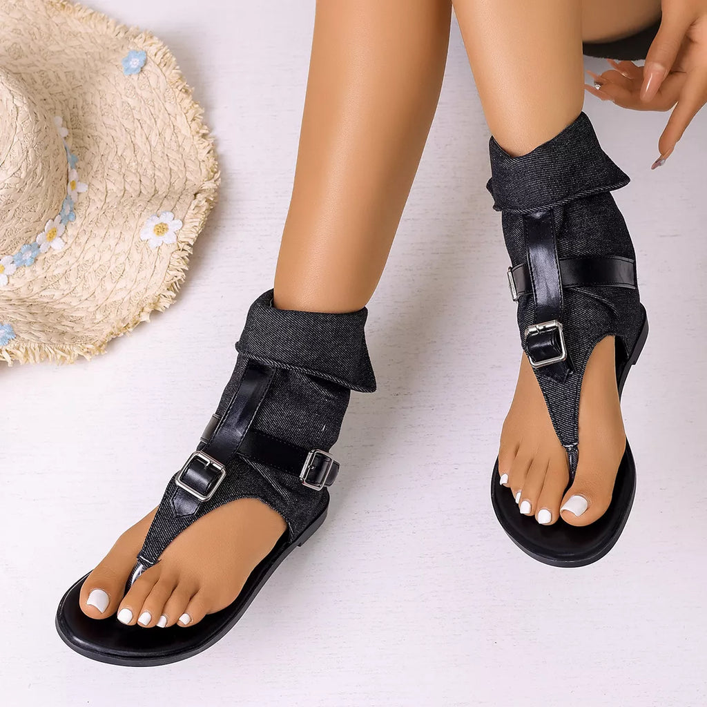 Plush Fashion Hub toe post buckle sandals with adjustable straps and comfortable sole on neutral background.
