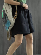 Casual elastic waist shorts from Trendsi featuring a relaxed fit, lightweight fabric, and comfortable design for everyday wear.