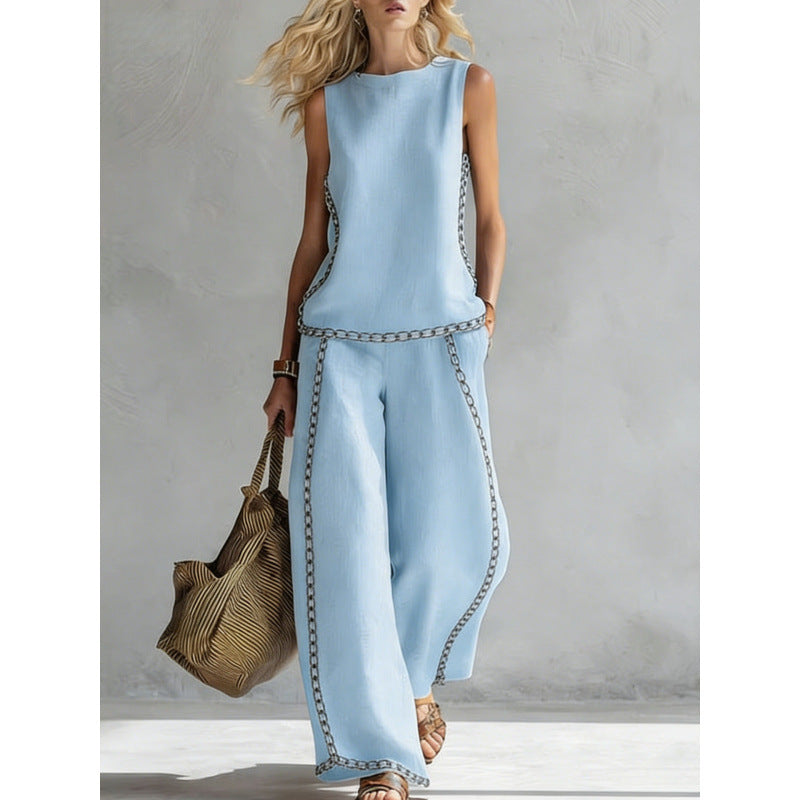 Printed retro sleeveless top and wide-leg pants set by Plush Fashion Hub, featuring vibrant prints and a stylish two-piece design.