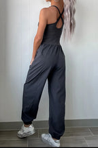 Plush Fashion Hub active wear jumpsuit with cutout square neckline, wide straps, and fitted design for workouts and casual wear.