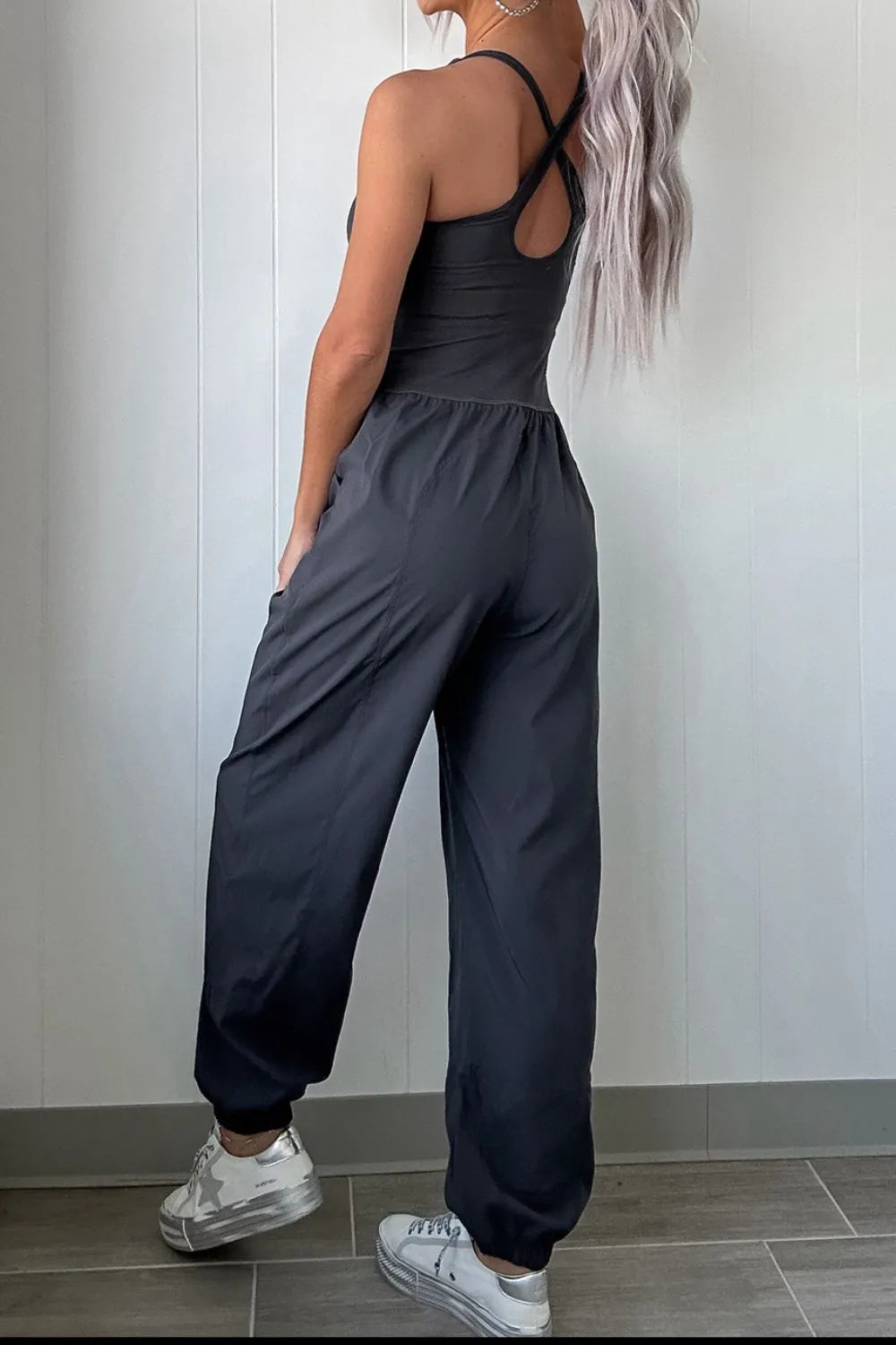 Plush Fashion Hub active wear jumpsuit with cutout square neckline, wide straps, and fitted design for workouts and casual wear.