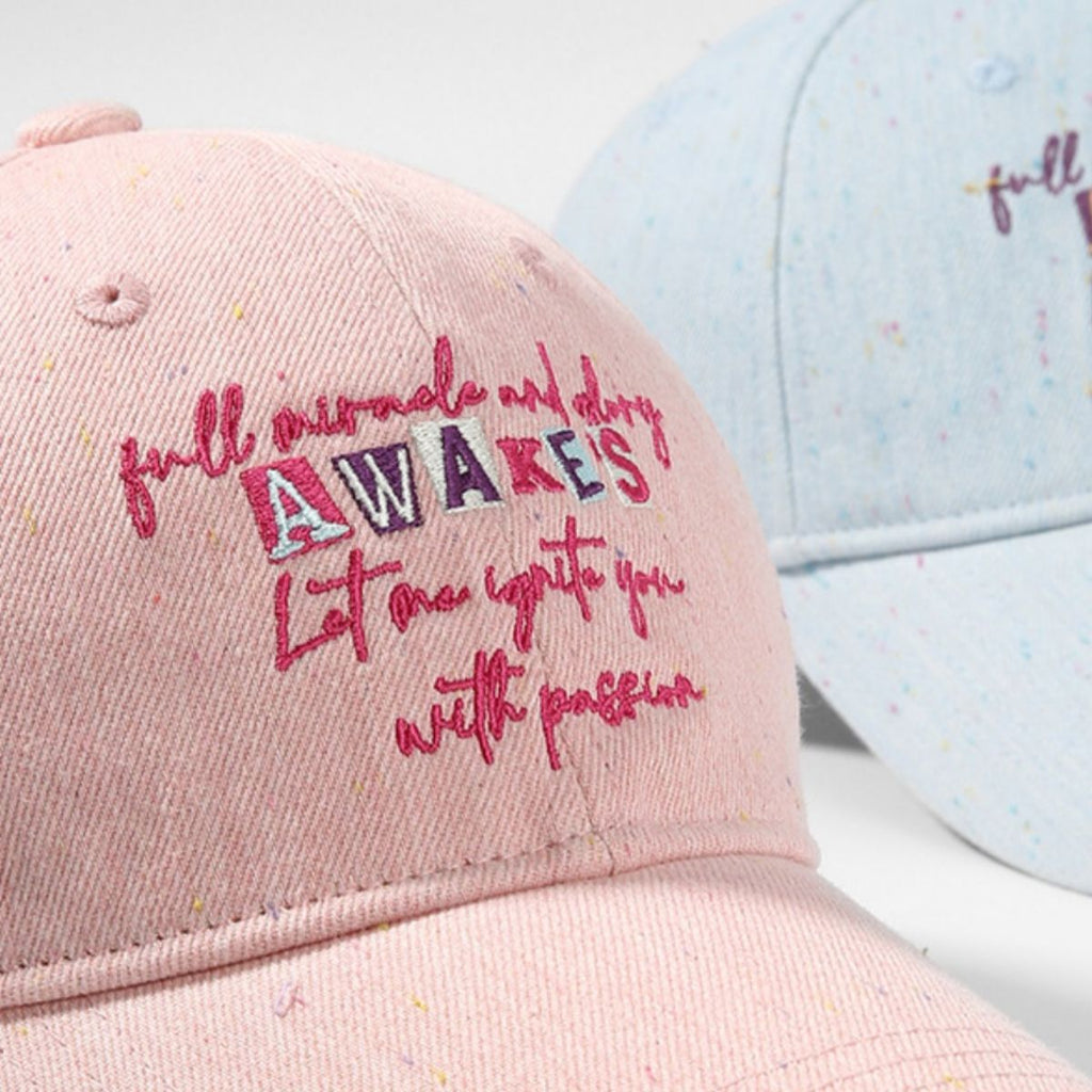 Embroidered cotton baseball cap by Trendsi featuring stylish athletic design and adjustable strap on a neutral background.