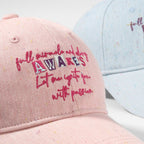 Embroidered cotton baseball cap by Trendsi featuring stylish athletic design and adjustable strap on a neutral background.
